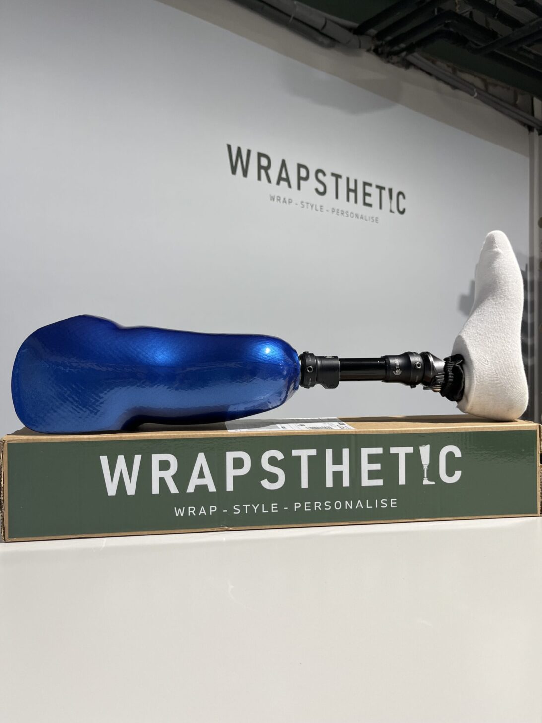Lower limb prosthetic in metallic electric blue